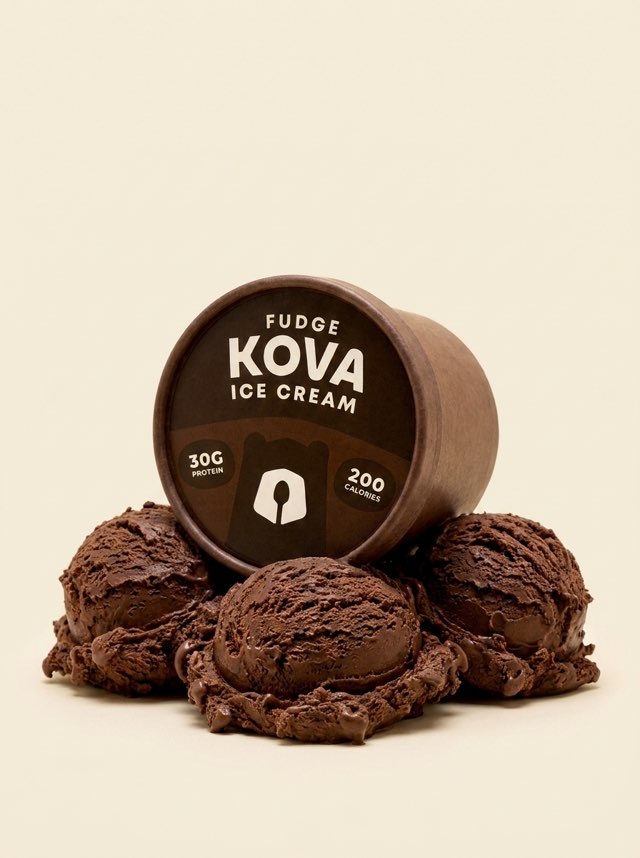 Generated for Kova. A product hero: the fudge Kova tub resting on three scoops of chocolate ice cream.